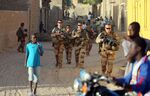 French soldiers of the Barkhane force patrol the streets of Timbuktu, northern Mali, on Dec. 5, 2021.