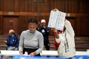 Electoral Commission officials count votes in Durban on May 29.