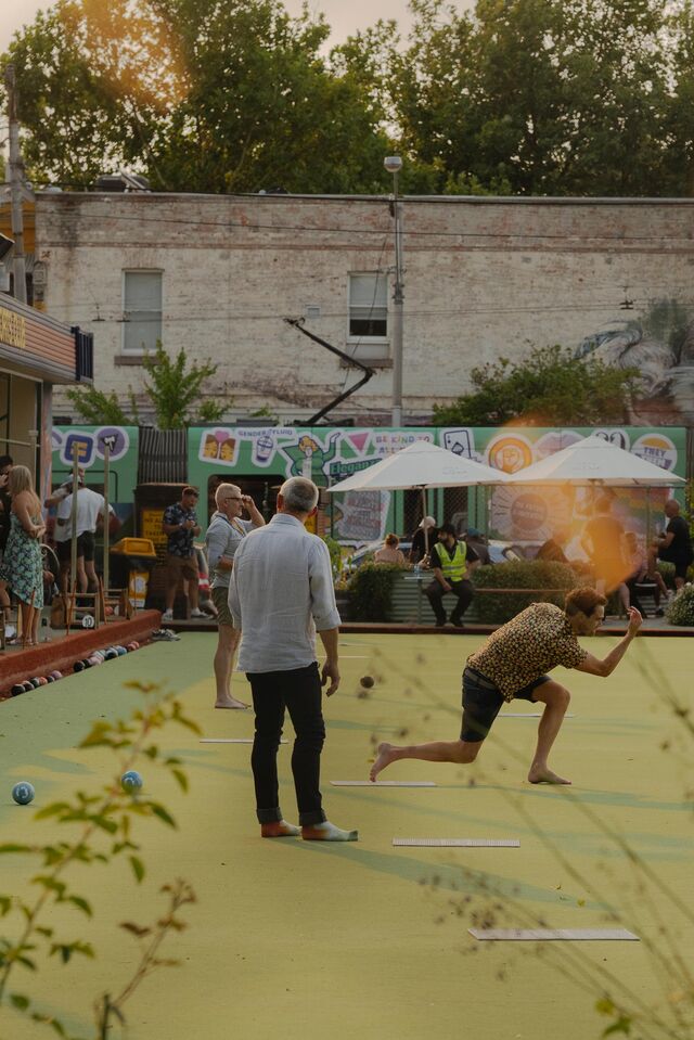 People enjoy barefoot bowls at the Fitzroy Victoria Bowling Club, Brunswick Street, Fitzroy North, Melbourne.