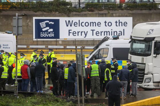 Clogged U.K. Port Reopens in Chaos as Truckers Await Covid Tests