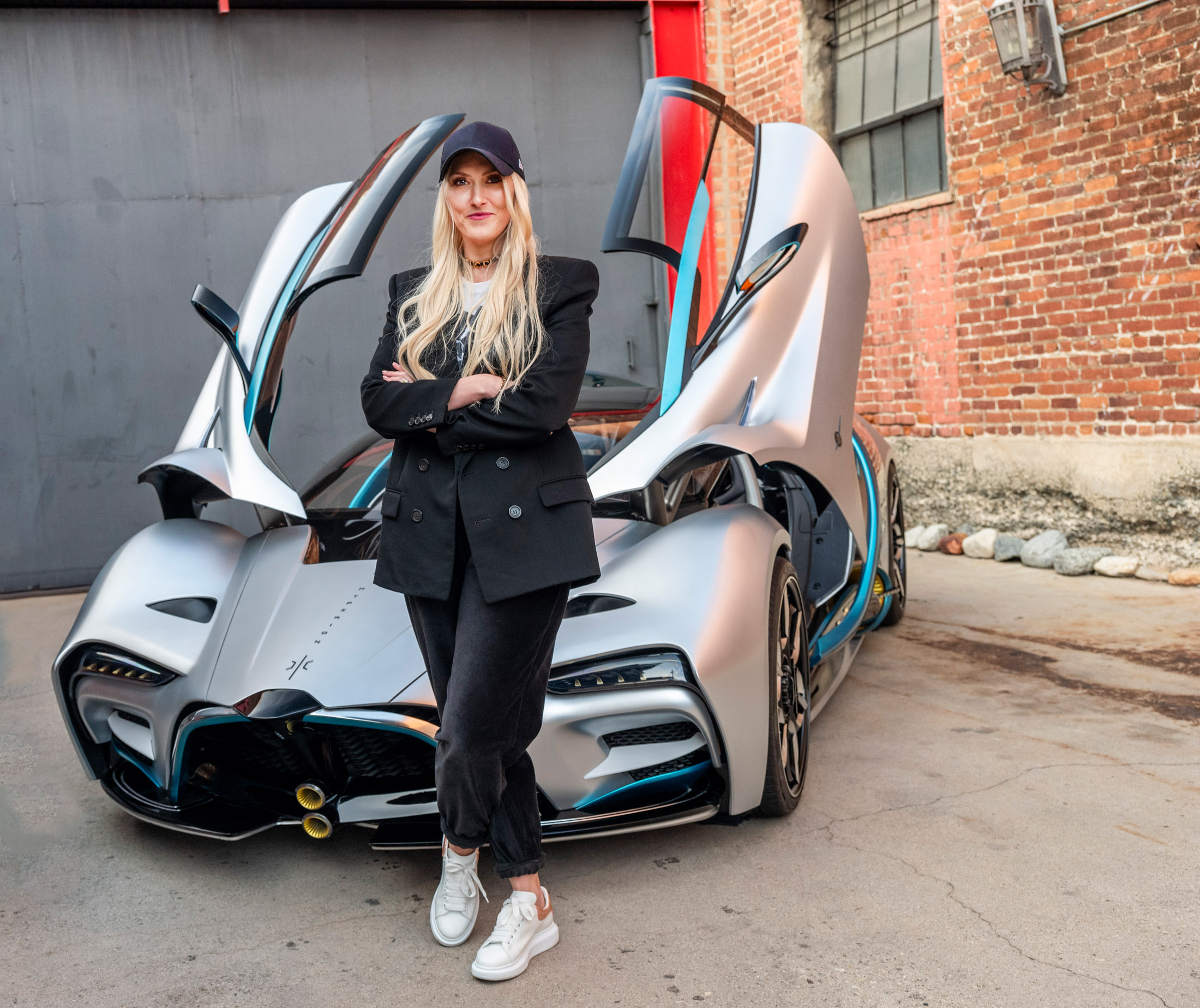 Alex Hirschi, aka Supercar Blondie, stands in front of the Hyperion&nbsp;XP-1 prototype.