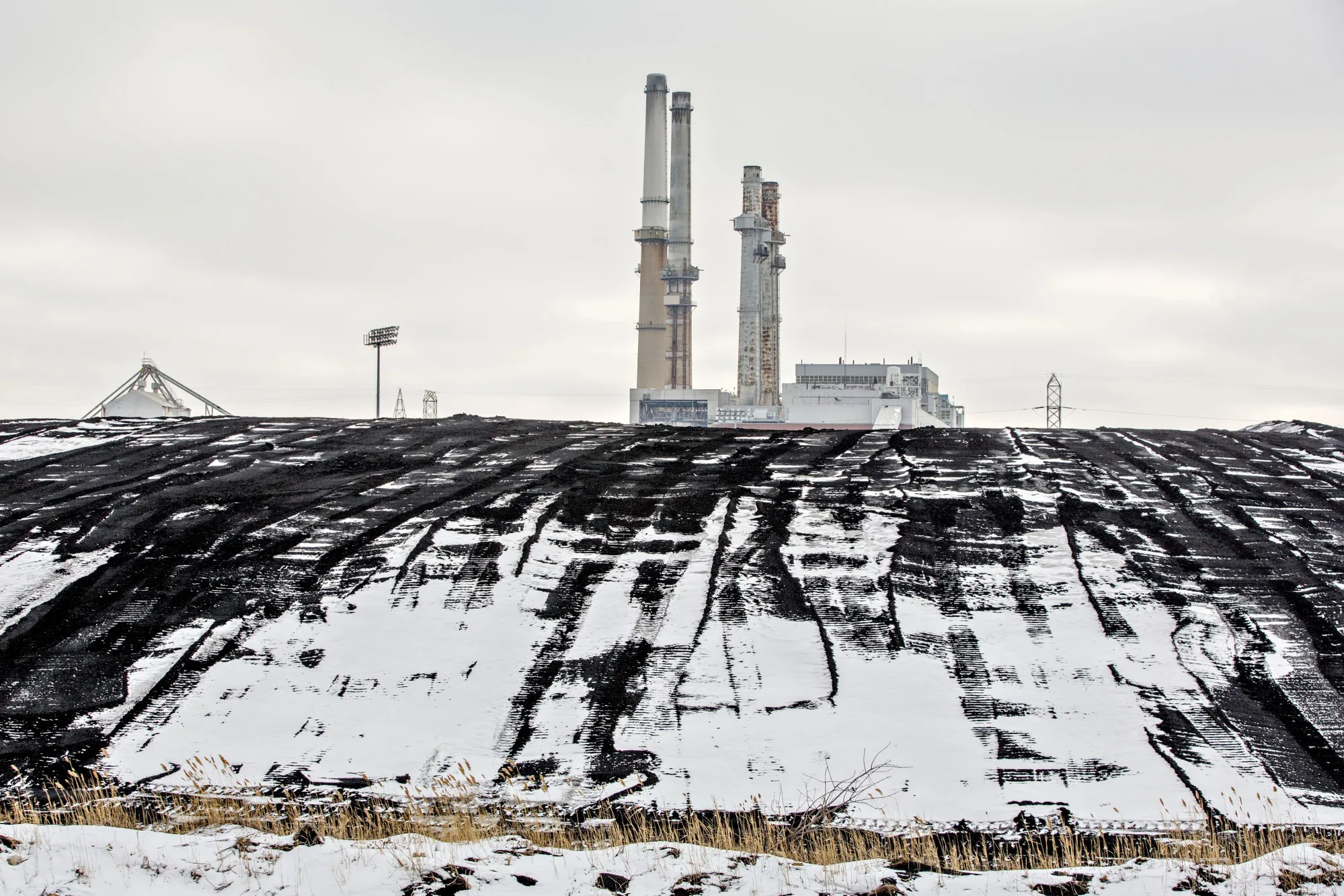 A pile of coal sits outside&nbsp;a coal-fired power plant&nbsp;in Romeoville, Illinois.
