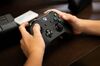 A customer holds a Microsoft Corp. XBox One game controller at the company's flagship store in New York, U.S., on Saturday, July 14, 2018. Microsoft Corp. is scheduled to release earnings figures on July 19.