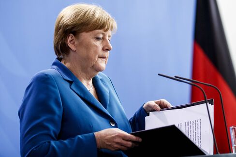 Angela Merkel gives a statement following the shootings on July 23.