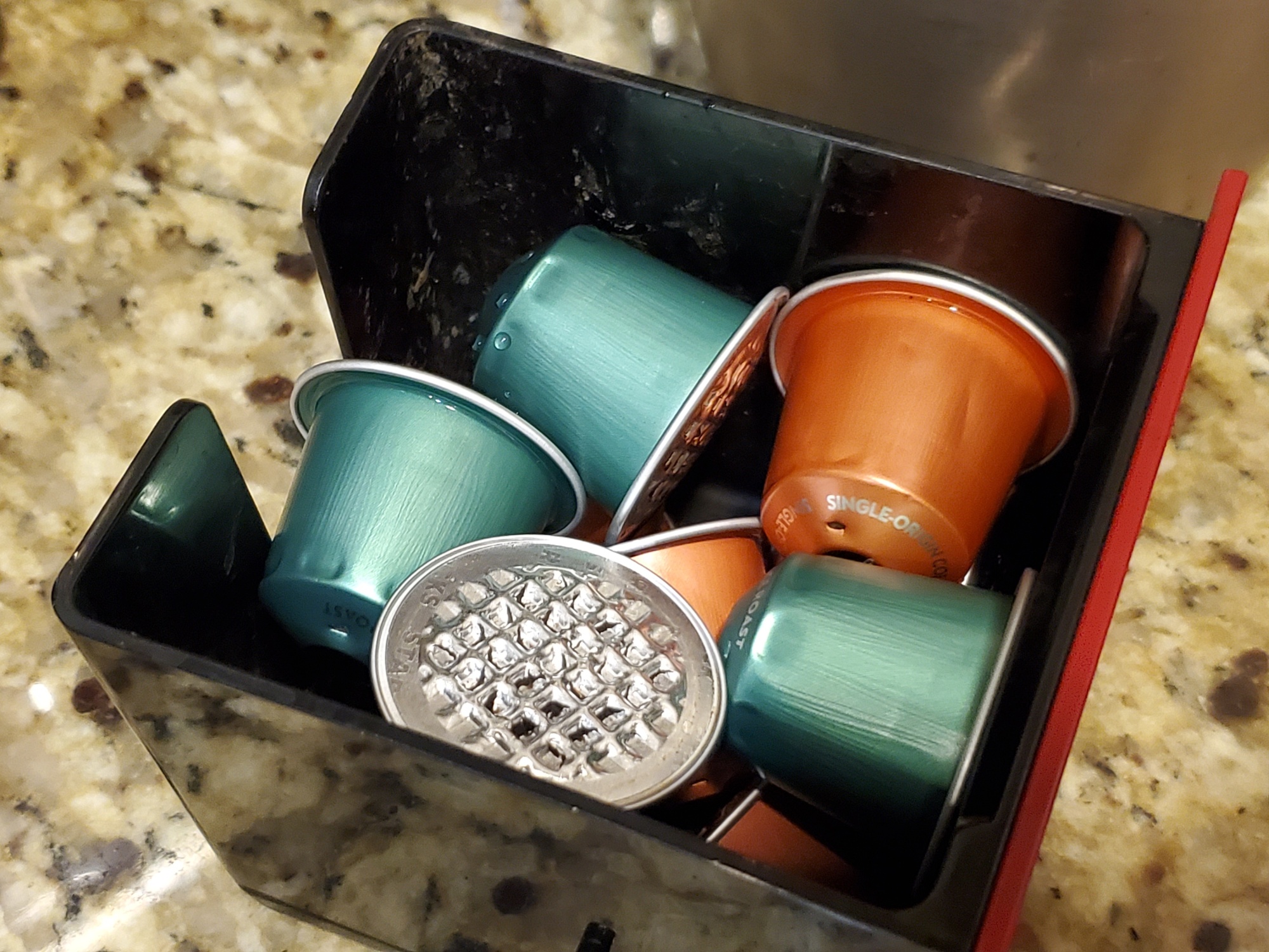 Used Nespresso single-serve coffee pods.