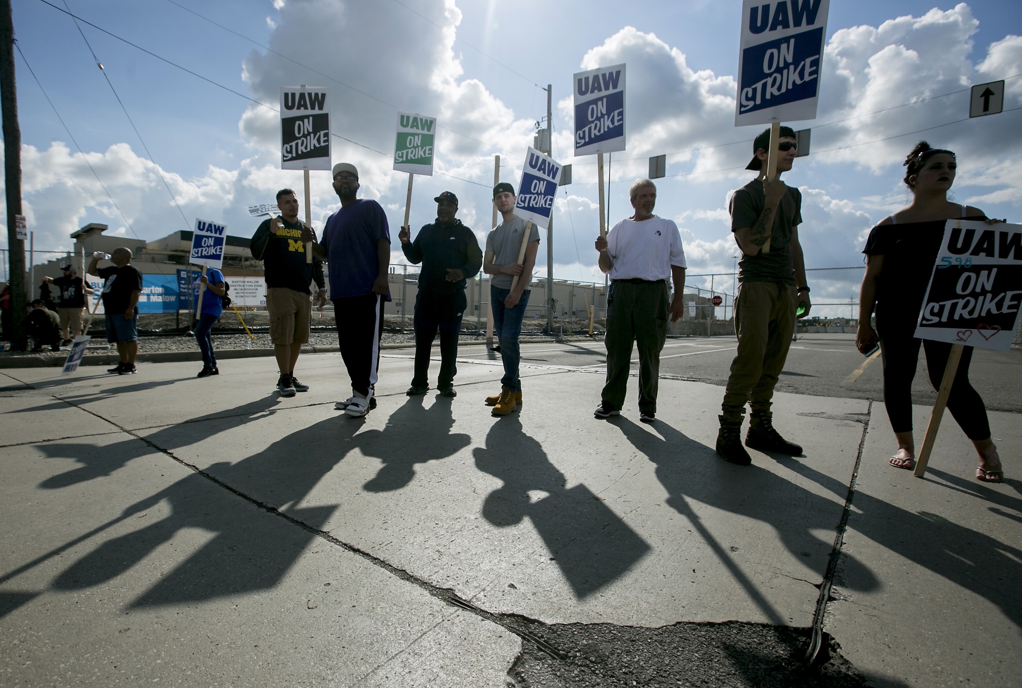 UAW workers strike outside GM’s Flint, Michigan, assembly plant in September.