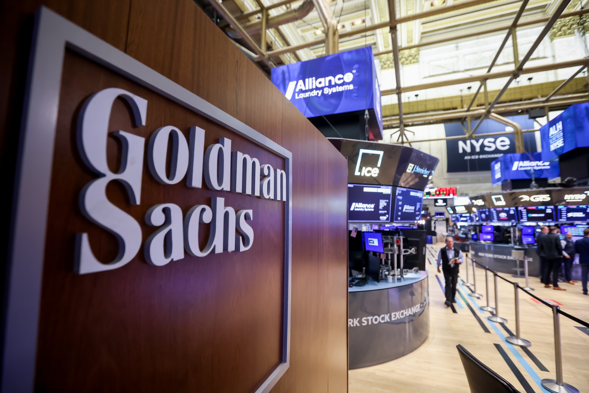 Goldman Sachs Group Inc. signage on the floor of the New York Stock Exchange (NYSE) in New York, US, on Thursday, Oct. 9, 2025. Goldman Sachs Group Inc. is scheduled to release earnings figures on October 14. Photographer: Michael Nagle/Bloomberg