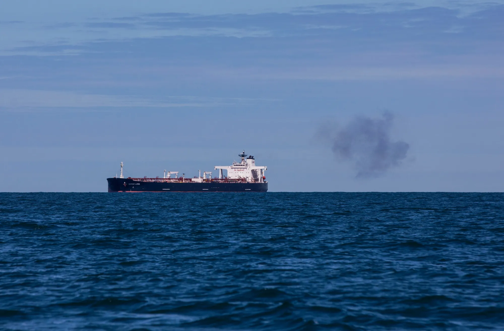 A puff of smoke blows away from the Nordic Luna, a Suezmax crude oil tanker operated by Nordic American Tankers Ltd.