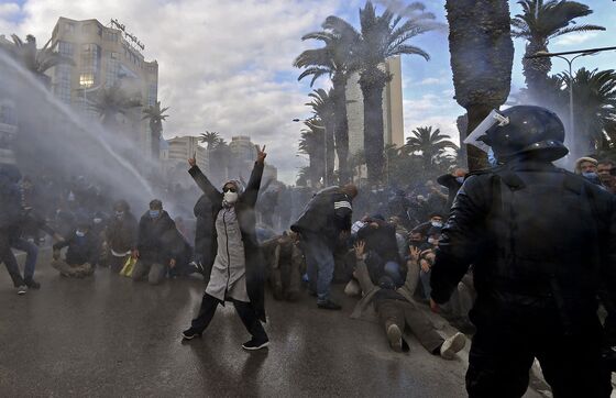 Clashes Erupt as Protesters in Tunisia Demand End to Power Grab