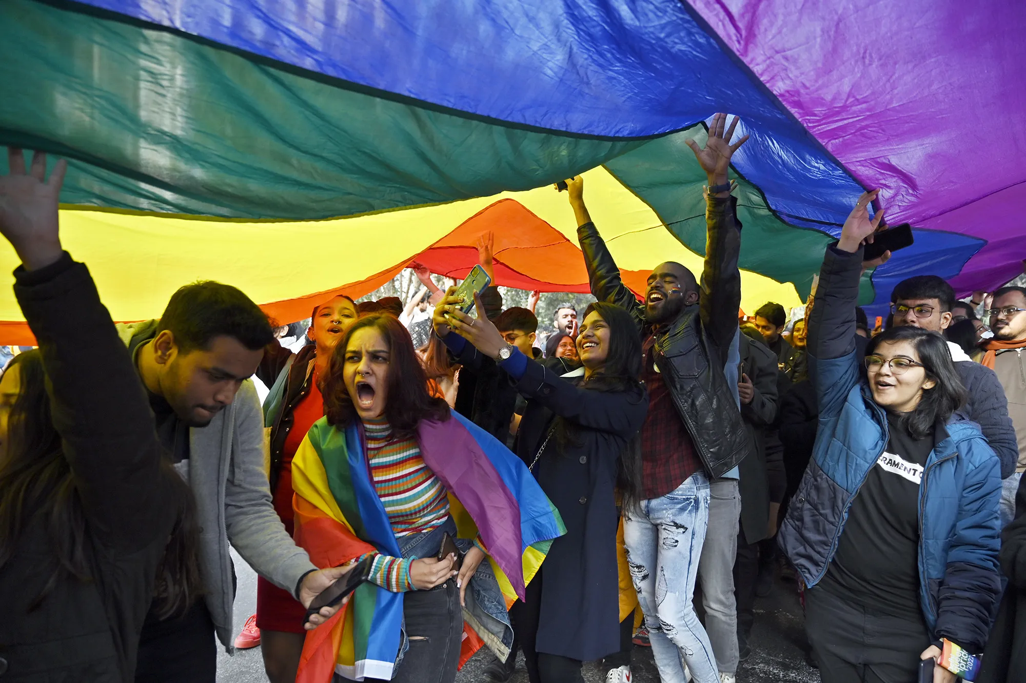 LGBTQ community members and supporters take part in a&nbsp;Pride parade&nbsp;in New Delhi.