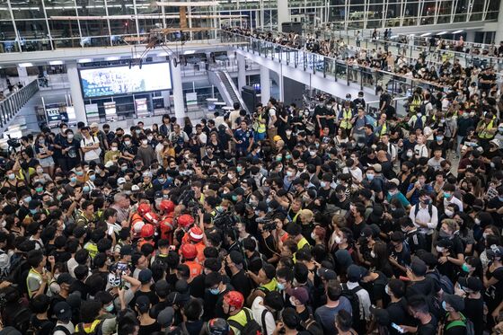 A Hellish Week for Cathay Buffeted Between China and Hong Kong