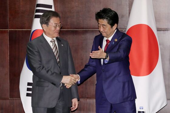 Japan, South Korea Tone Down Feud At Summit Yet Disputes Remain