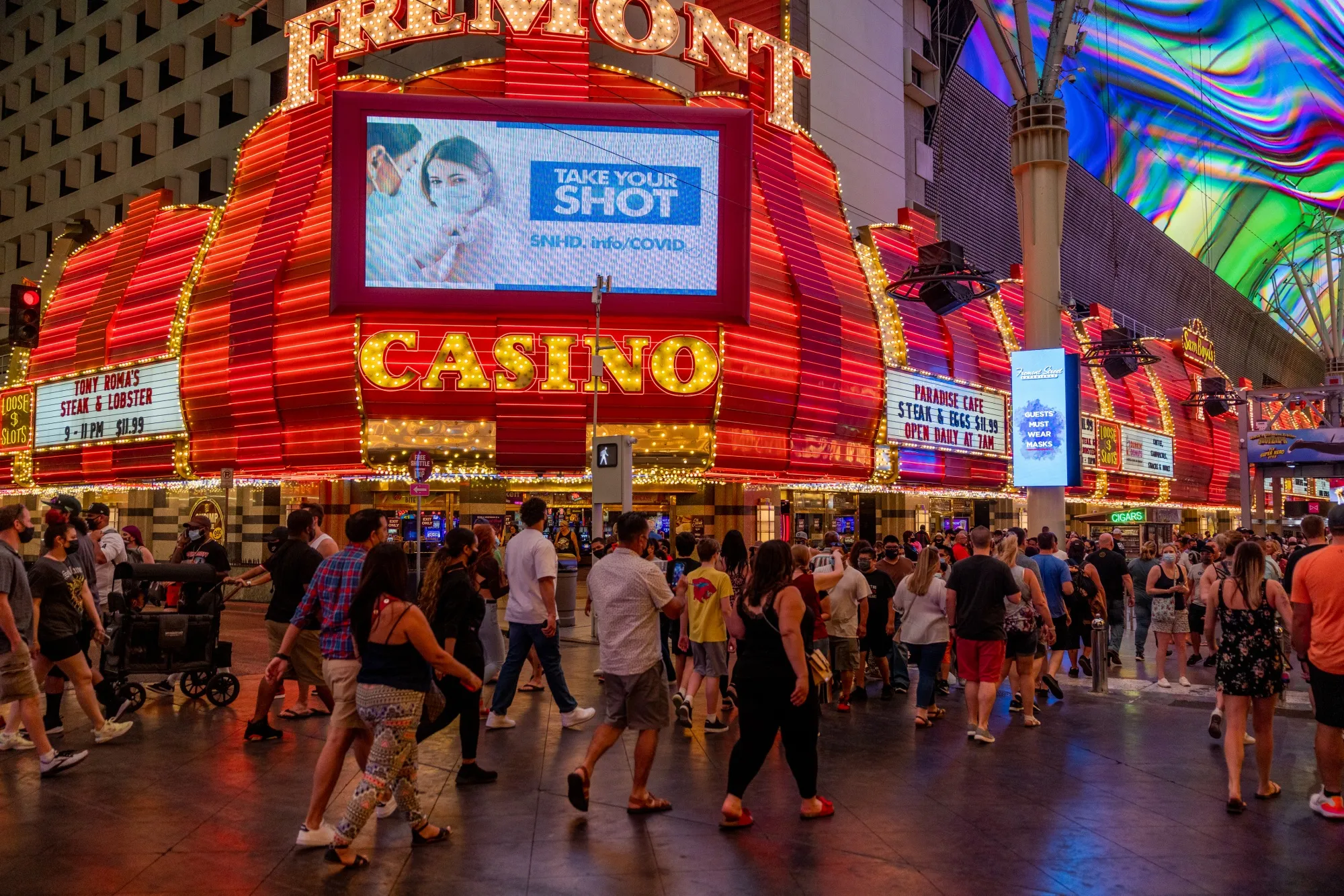 Pedestrians walk through downtown Las Vegas on May 1.