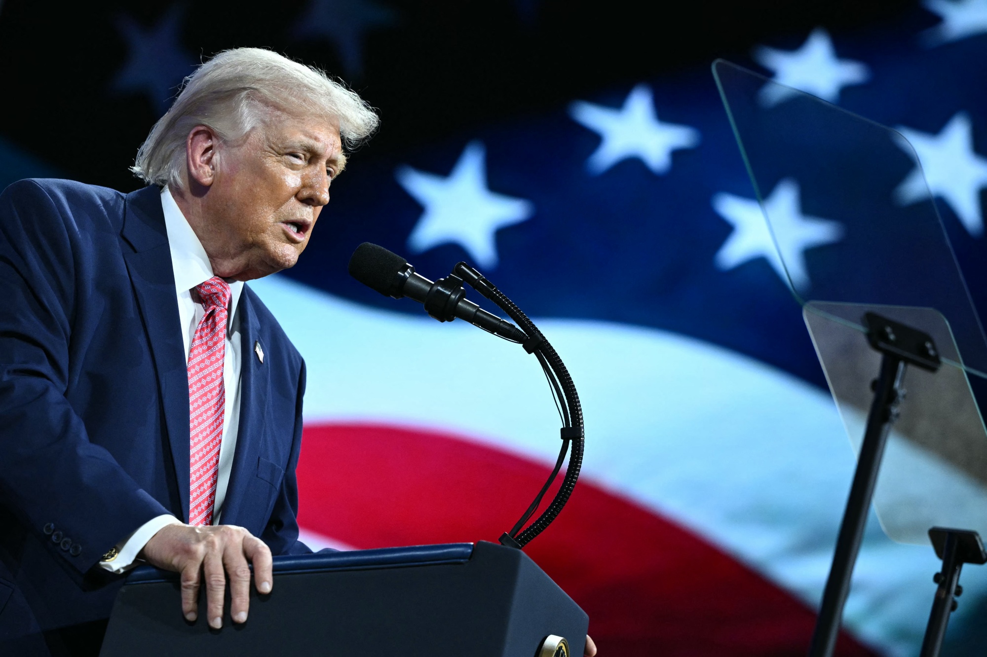 TOPSHOT - US President Donald Trump speaks during the Future Investment Initiative (FII) Summit in Miami Beach, Florida, on March 27, 2026. (Photo by Mandel NGAN / AFP via Getty Images)