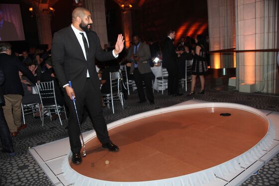 Quants Play Elliptical Golf, Toast Ex-Baltimore Raven John Urschel at Math Gala