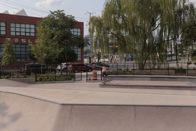 A Tesla dealership across the street from the Harold Ickes Playground skate park in the Red Hook neighborhood of Brooklyn.