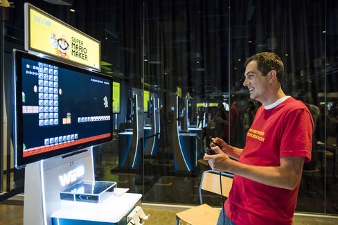 Nintendo employee Corey Olcsvary judges a newly created level for Super Mario Maker during a hackathon at the Facebook headquarters in Menlo Park, Calif., on July 29, 2015.