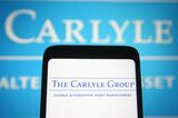 In this photo illustration, the Carlyle Group logo of a US