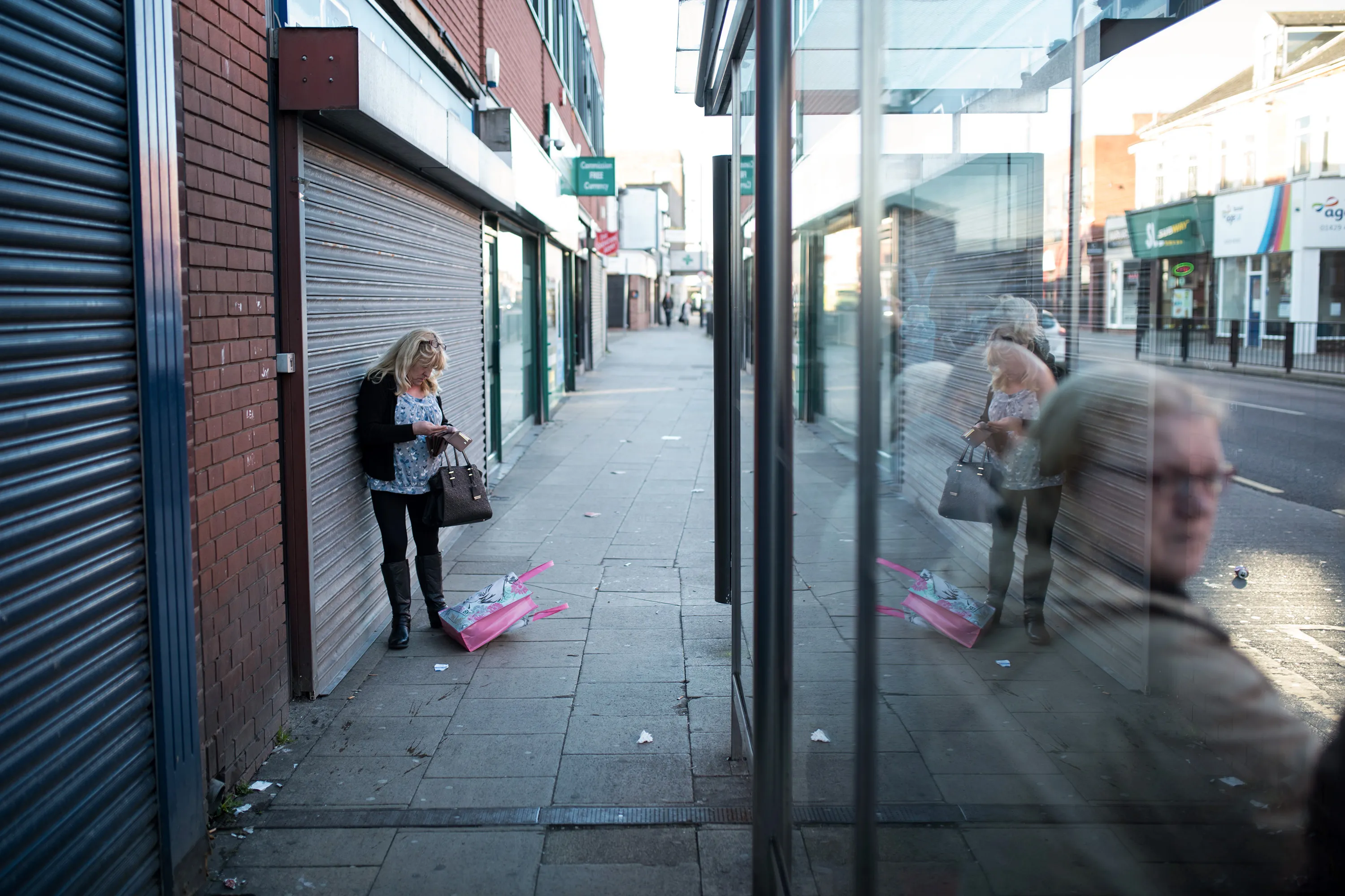 A woman checks her purse&nbsp;in the center&nbsp;of&nbsp;Hartlepool.