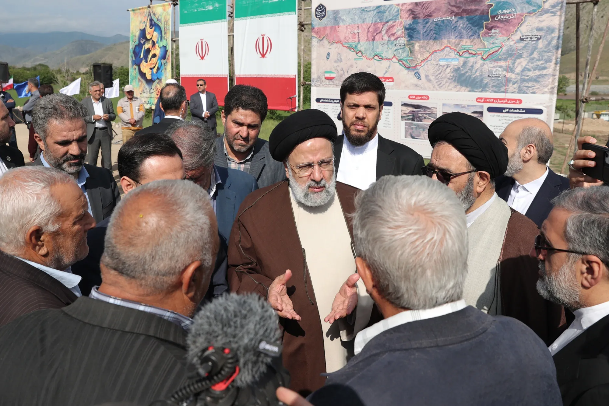 Raisi visiting the site of a road and rail bridge project in Azerbaijan on May 19.