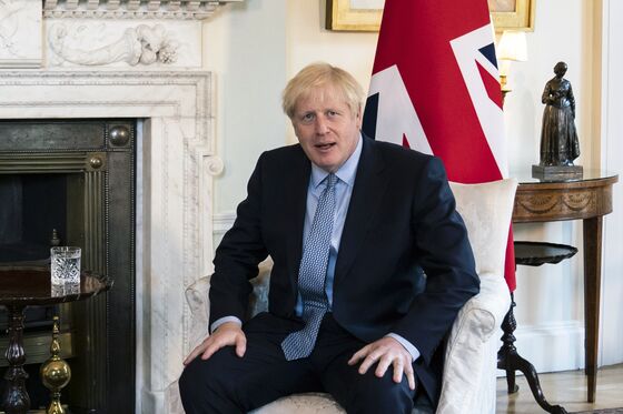 U.K.’s Johnson Accused of Spending for Votes, Not Fixing Economy