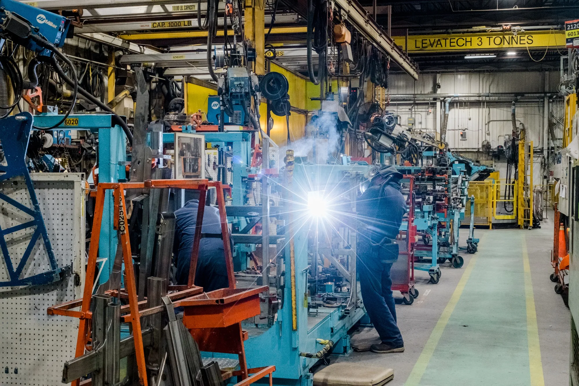 A welder works at a factory in Sainte-Claire, Quebec, Canada.