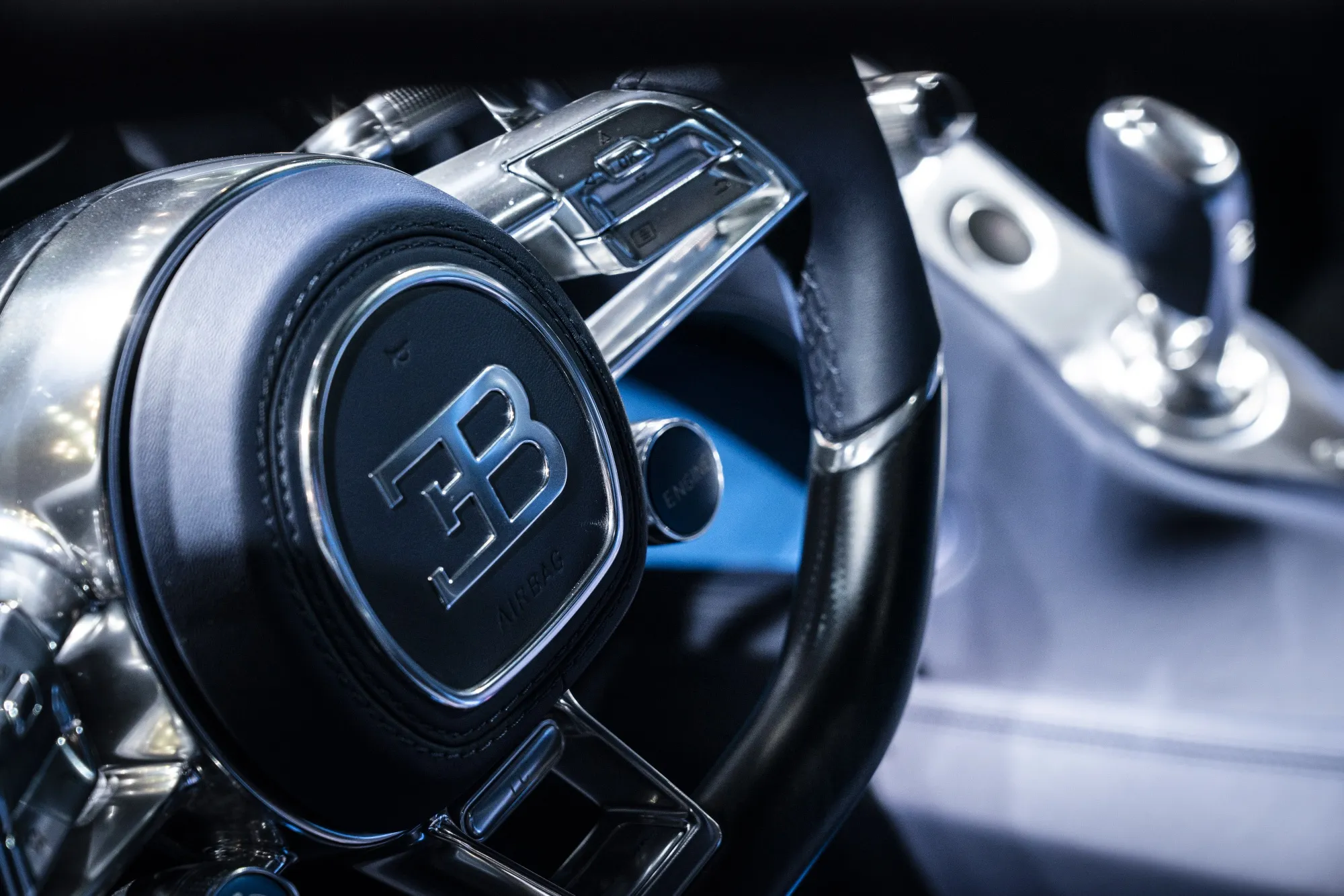 The steering wheel of a Bugatti Automobiles SAS Chiron Sport vehicle