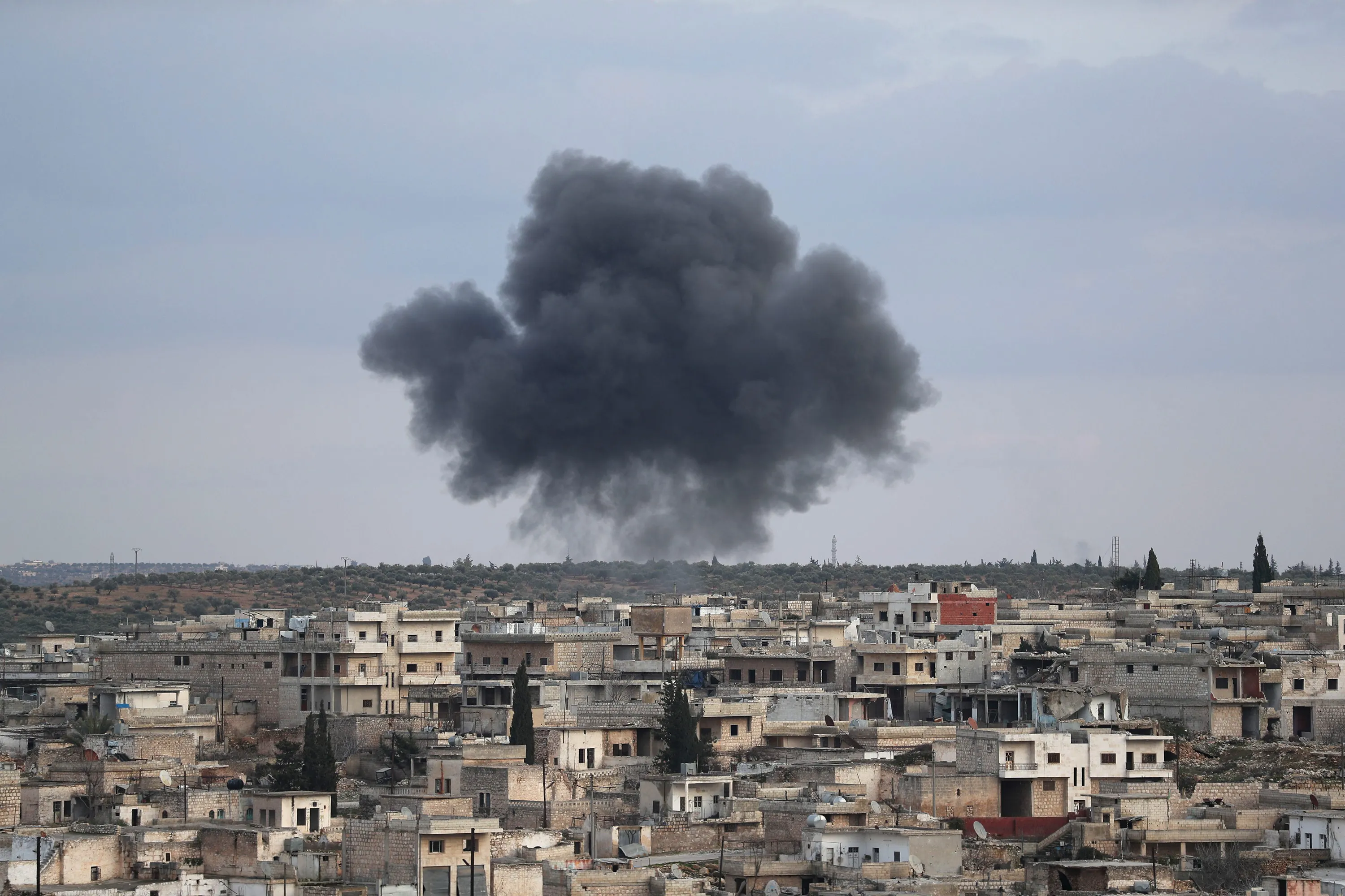 Smoke billows following reported bombardment by Syrian regime forces on the town of Kafr Ruma on the outskirts of Ma’arrat al-Nu’man on Jan.&nbsp;&nbsp;27.