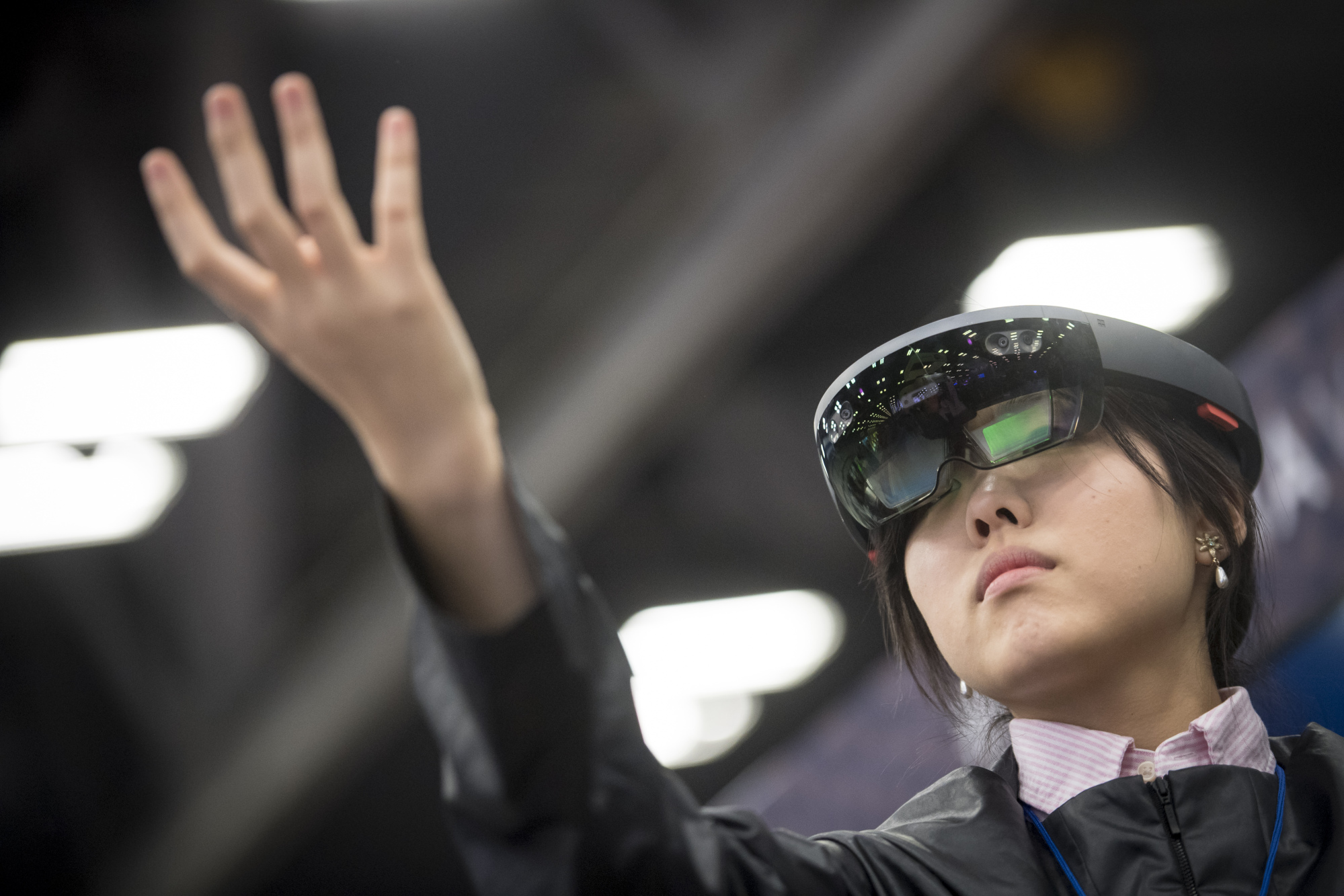 An attendee wears a HoloLens headset at SXSW.