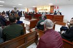 Iraqis attend a court session at the Supreme Judicial Council in&nbsp;Baghdad on Dec.&nbsp;27.
