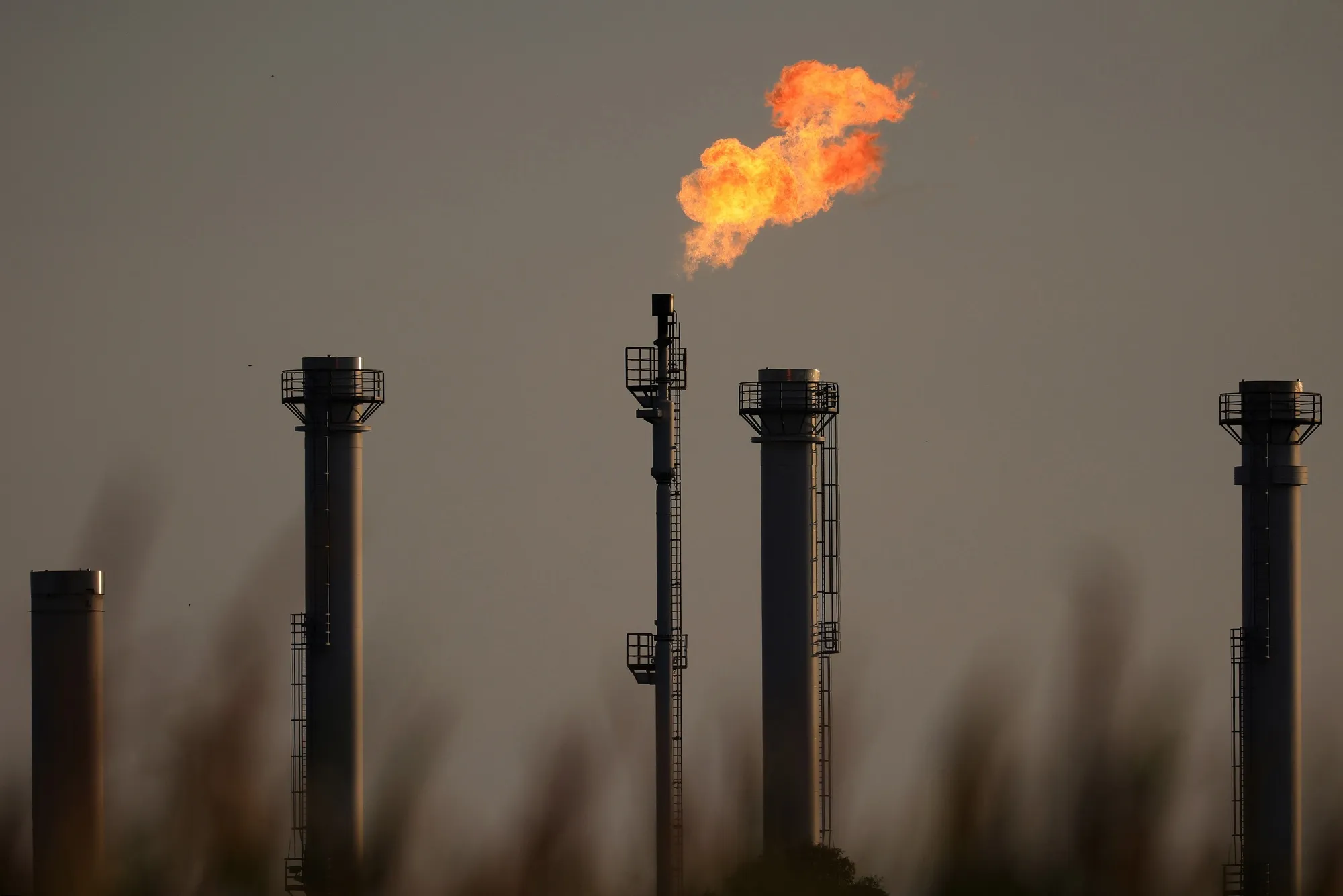 A flare stack burns at a natural gas storage facility in Germany.