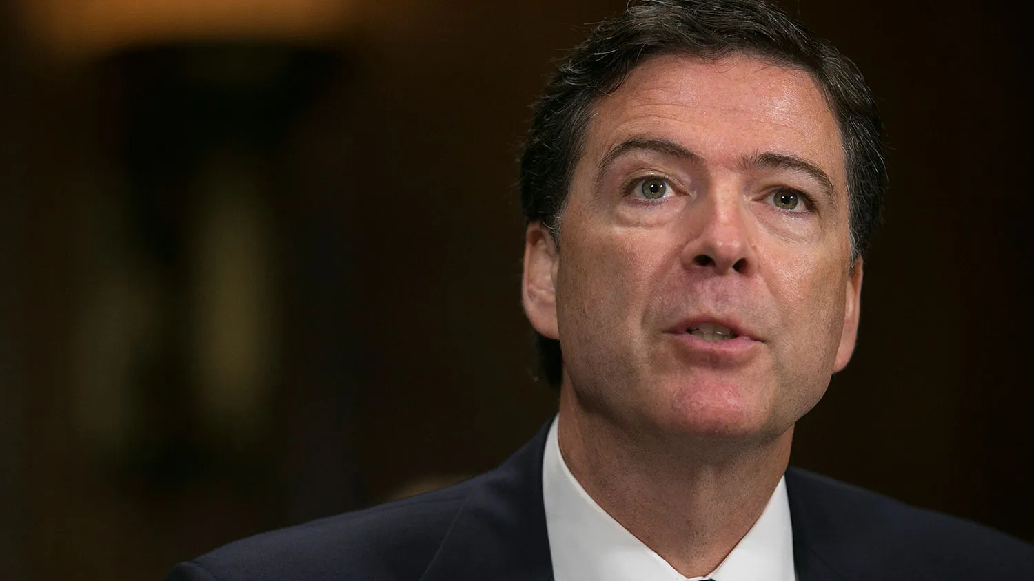 James Comey, U.S. President Barack Obama's nominee as director of the director of the Federal Bureau of Investigation (FBI), speaks during a Senate Judiciary Committee hearing in Washington, D.C., U.S., on Tuesday, July 9, 2013.
