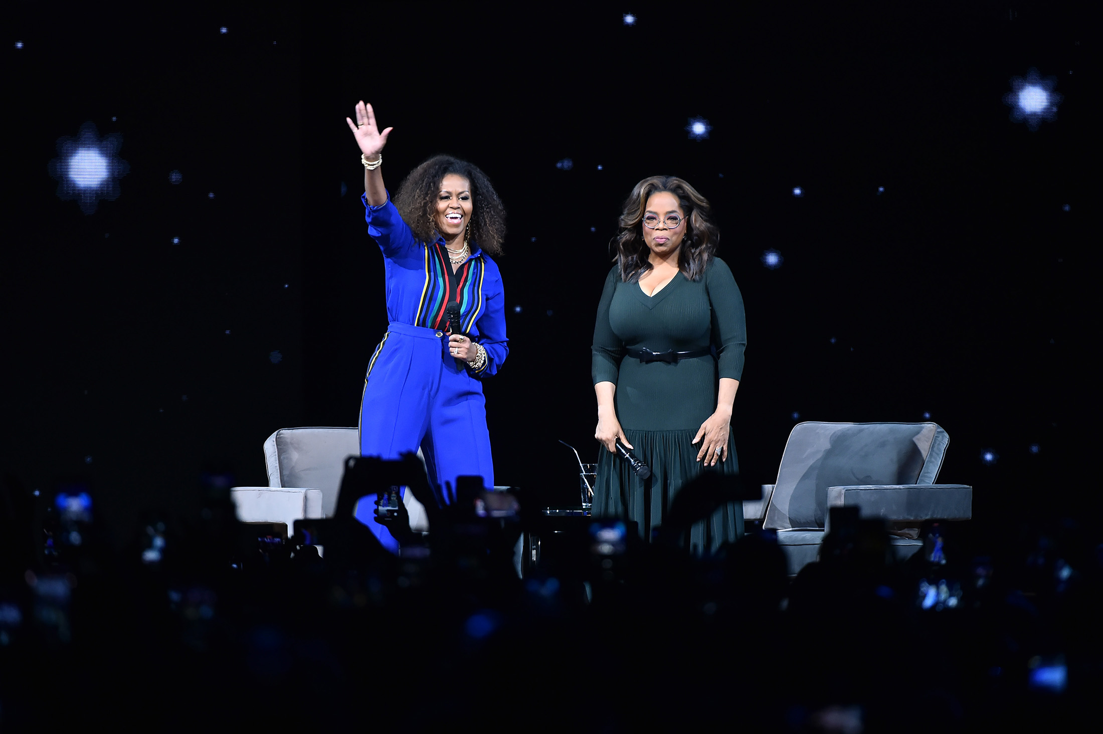 Michelle Obama, Oprah Winfrey Headline Arena Like Rock Stars