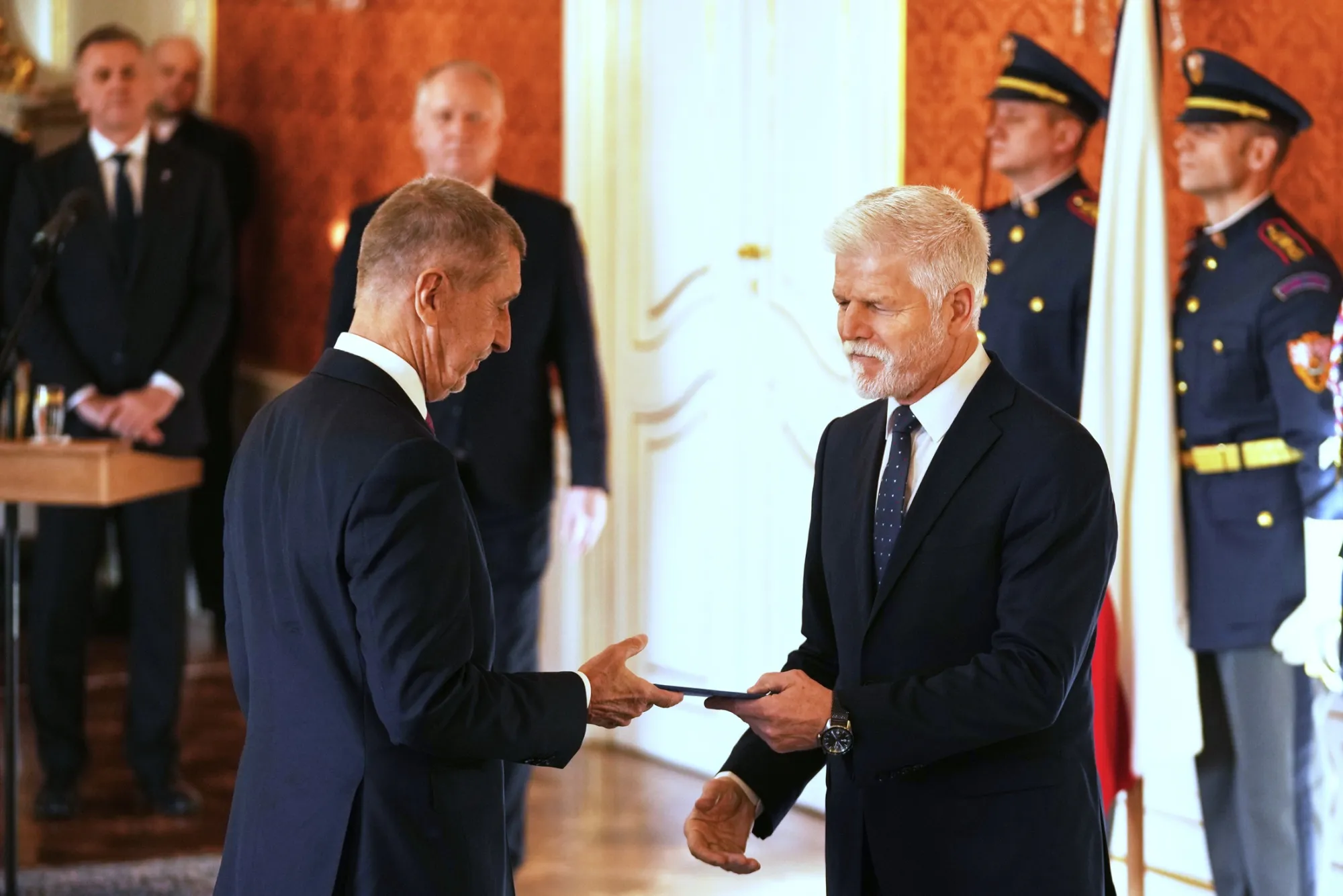 Andrej Babis, left, is sworn in as prime minister by Czech President Petr Pavel at Prague Castle, on Dec. 9.