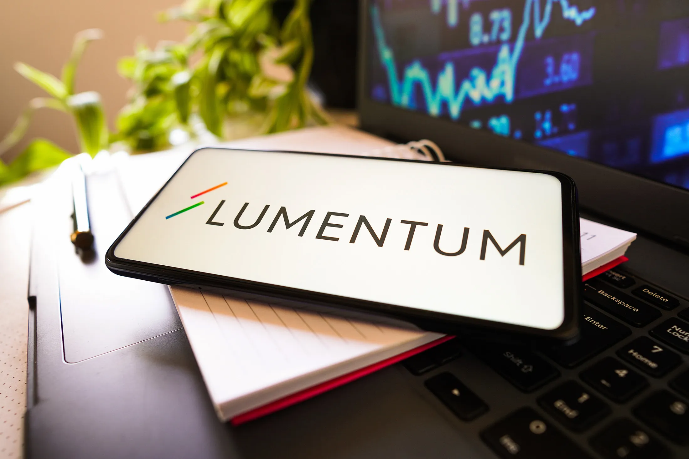 In this photo illustration, the Lumentum Holdings logo is