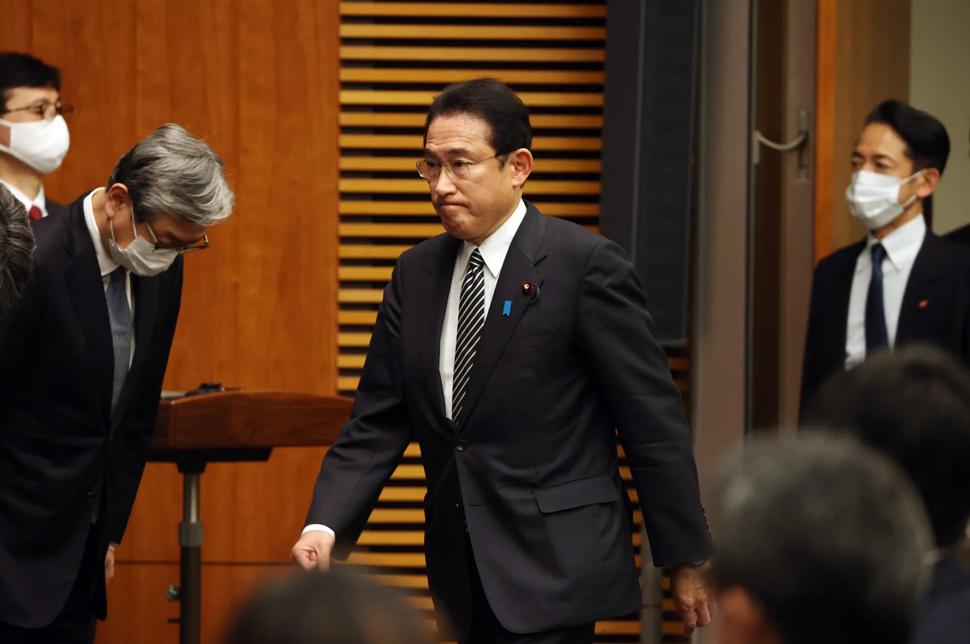 Fumio Kishida arrives for a news conference on Dec. 21.