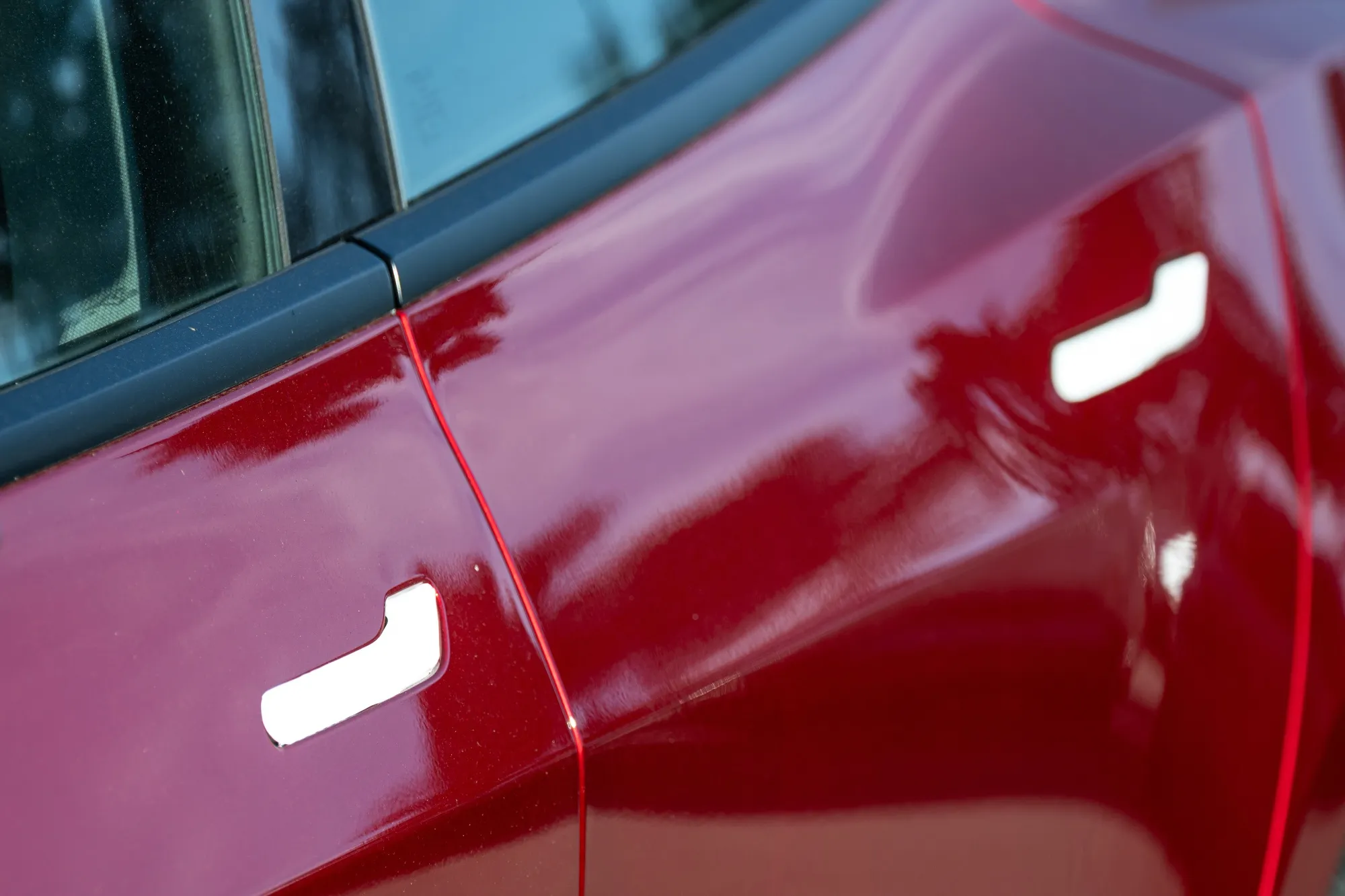 Door handles on a Tesla vehicle at a dealership&nbsp;in Colma, California.