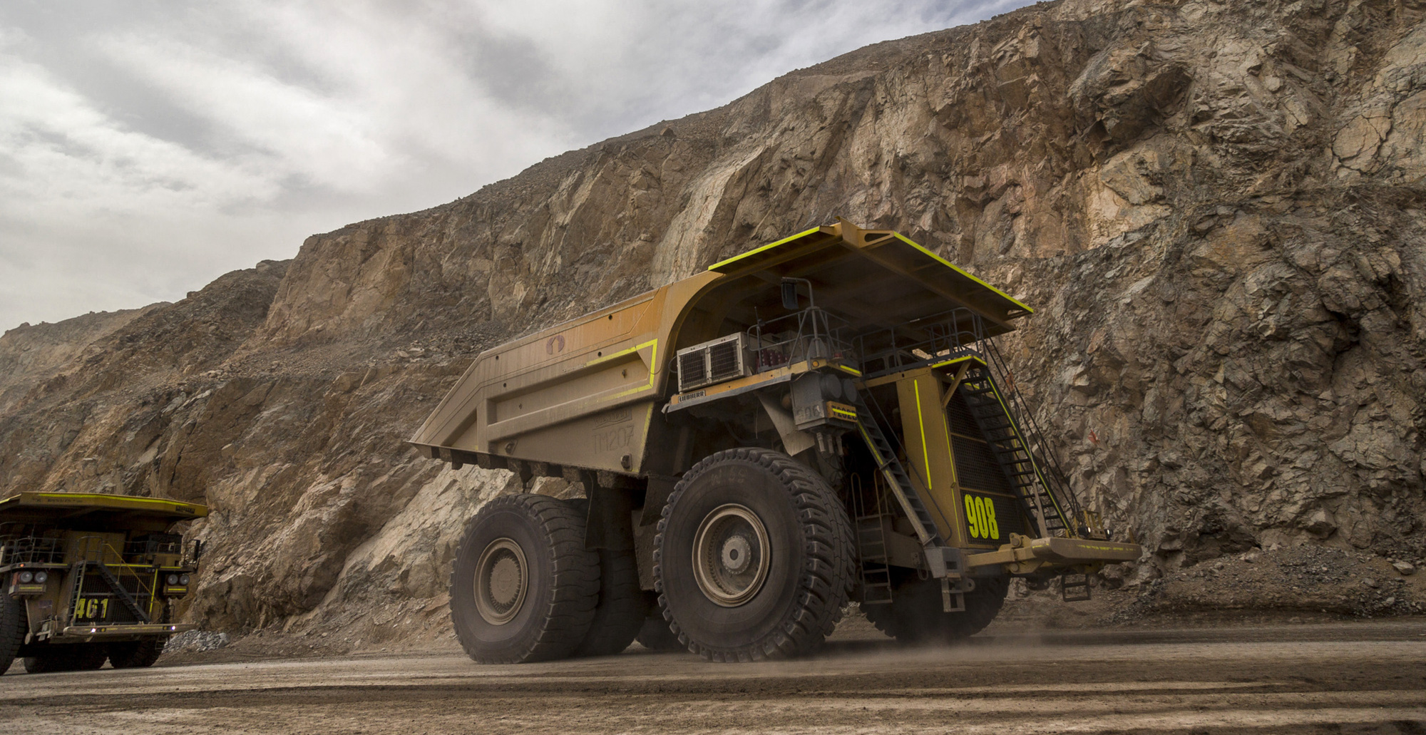 Trucks transport minerals inside the Codelco Chuquicamata open pit copper mine near Calama, Chile.