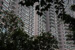 A residential building stands in the Tung Chung area of Hong Kong, China, on Wednesday, Feb. 3, 2016. Hong Kong is seeing negative-equity mortgages for the first time since September 2014.
