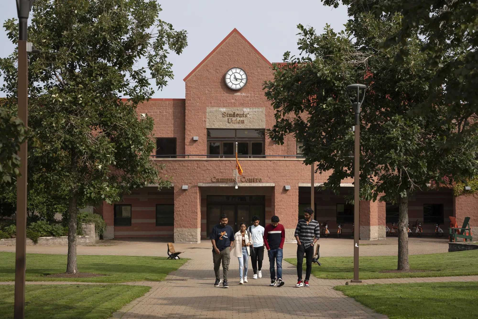 Students walk on campus at Cape Breton University in Sydney, Nova Scotia.&nbsp;