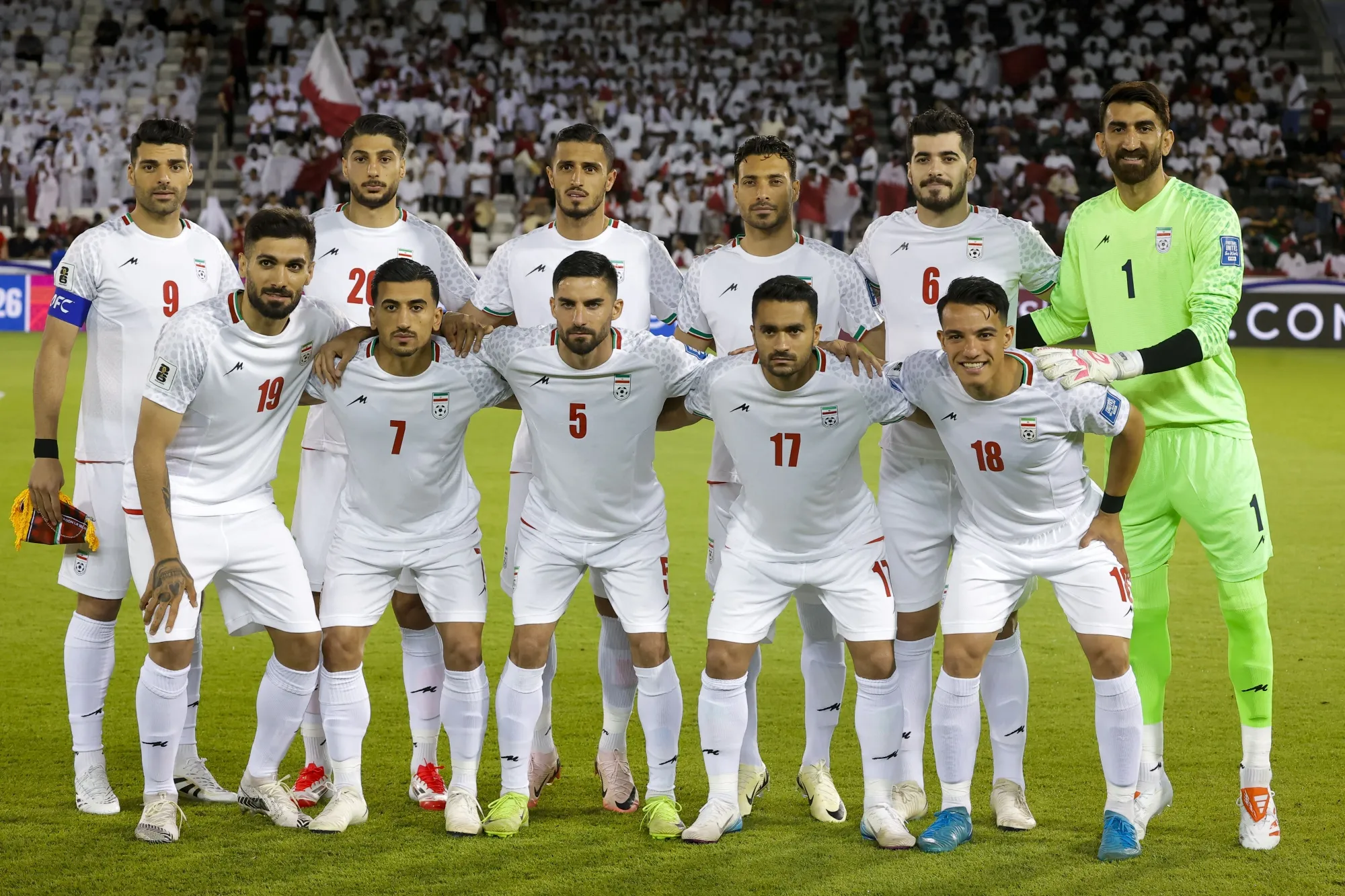 Iran’s players pose for a group picture ahead of the 2026 FIFA World Cup Asian Qualifier football match between Qatar and Iran in Doha on June 5, 2025.