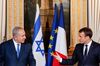 Israeli Prime Minister Benjamin Netanyahu (L) and French President Emmanuel Macron