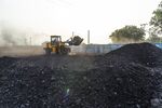 A front loader moves coal in Chandwa, Jharkhand, India.