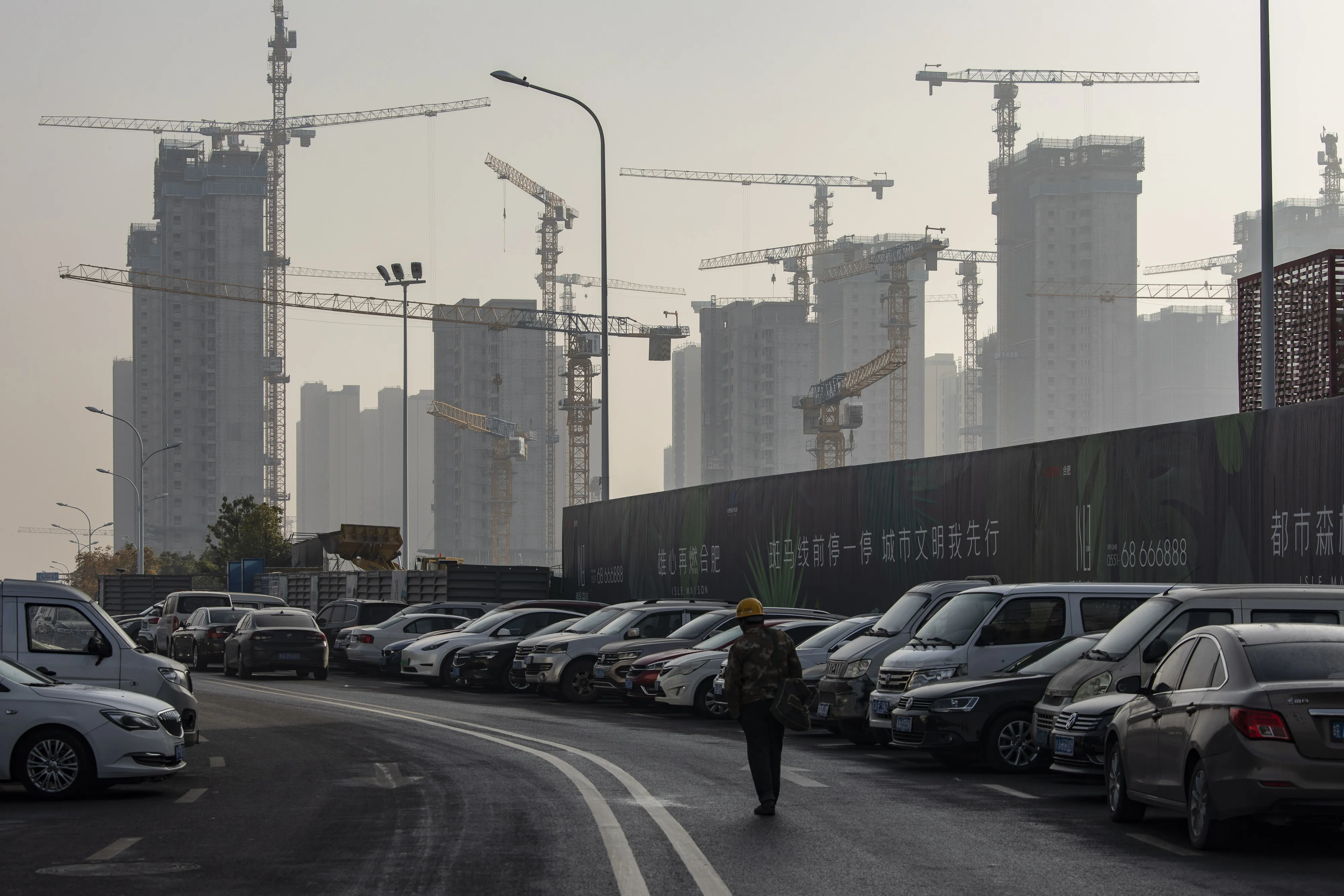 Residential buildings under construction at China Vanke Co.'s Isle Maison development in Hefei, China.