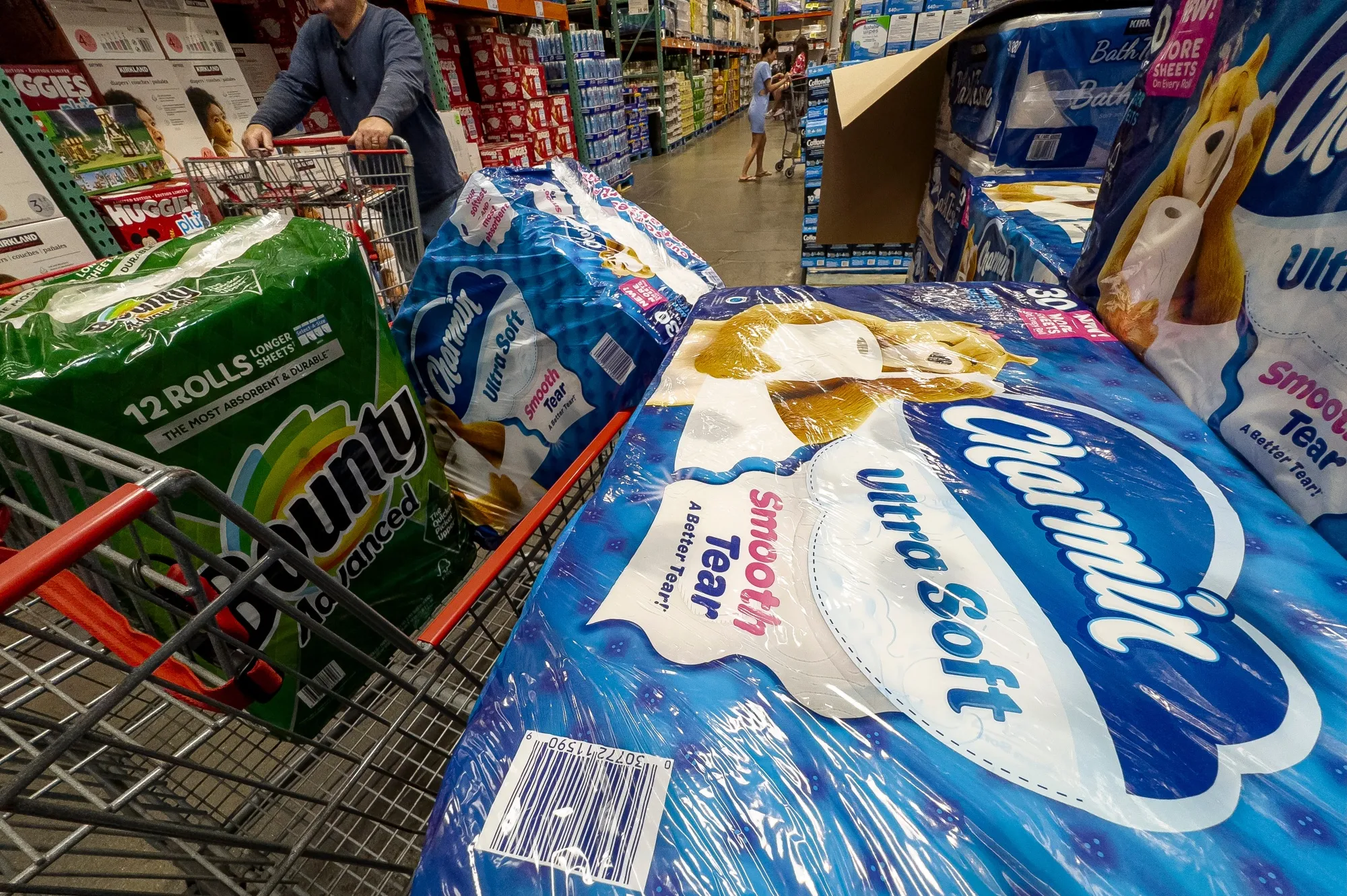 Proctor &amp; Gamble Bounty brand paper towels and Charmin bathroom tissues in a shopping cart at a store in Vallejo, California, US.