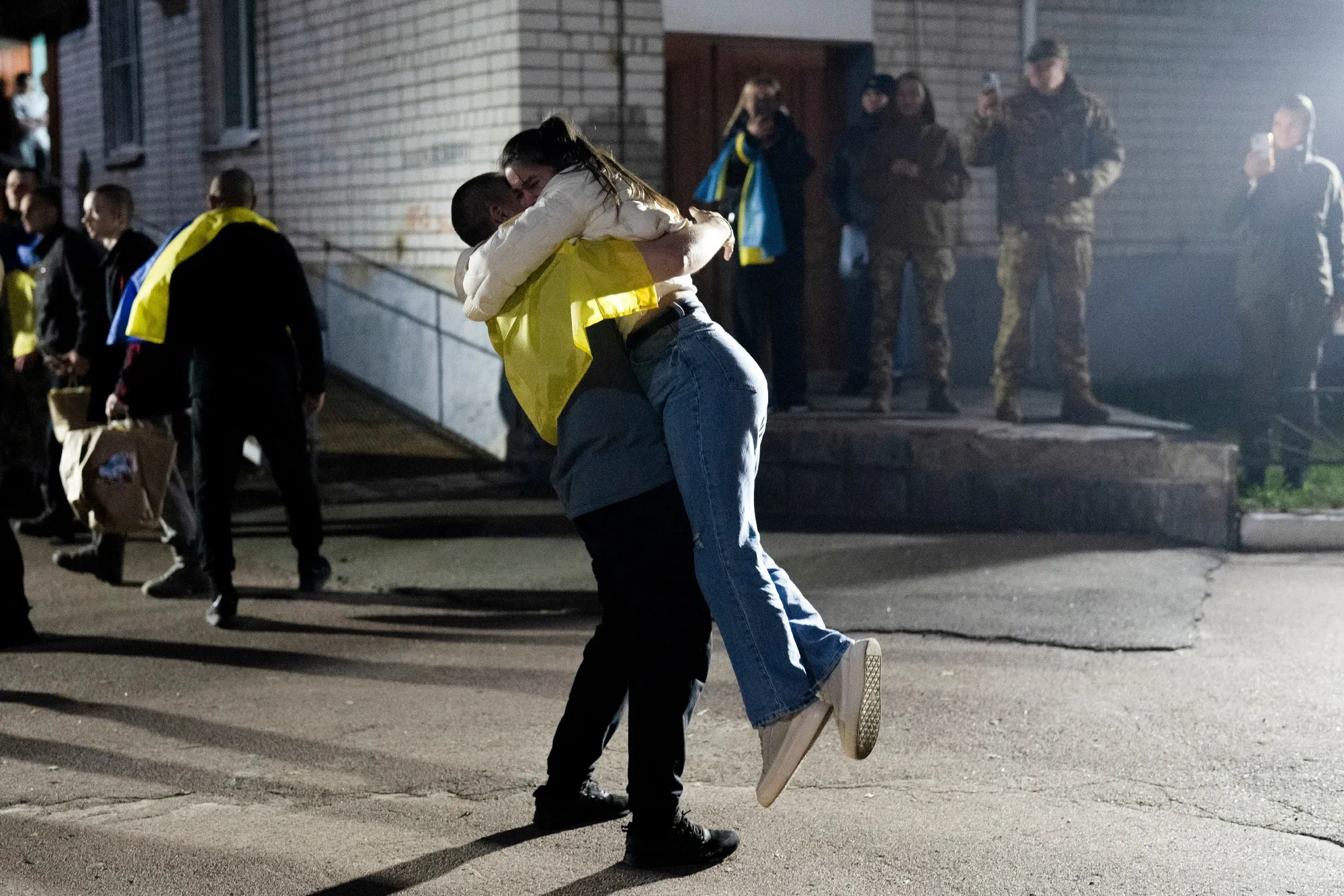 Relatives welcome Ukrainian prisoners of war (POW) following a prisoner swap with Russia on Oct. 18.
