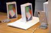 Apple Inc. iPhone X smartphones sit on a counter during the sales launch at a store in New York, U.S., on Friday, Nov. 3, 2017. The $1,000 price tag on Apple Inc.'s new iPhone X didn't deter throngs of enthusiasts around the world who waited -- sometimes overnight -- in long lines with no guarantee they would walk out of the store with one of the coveted devices.