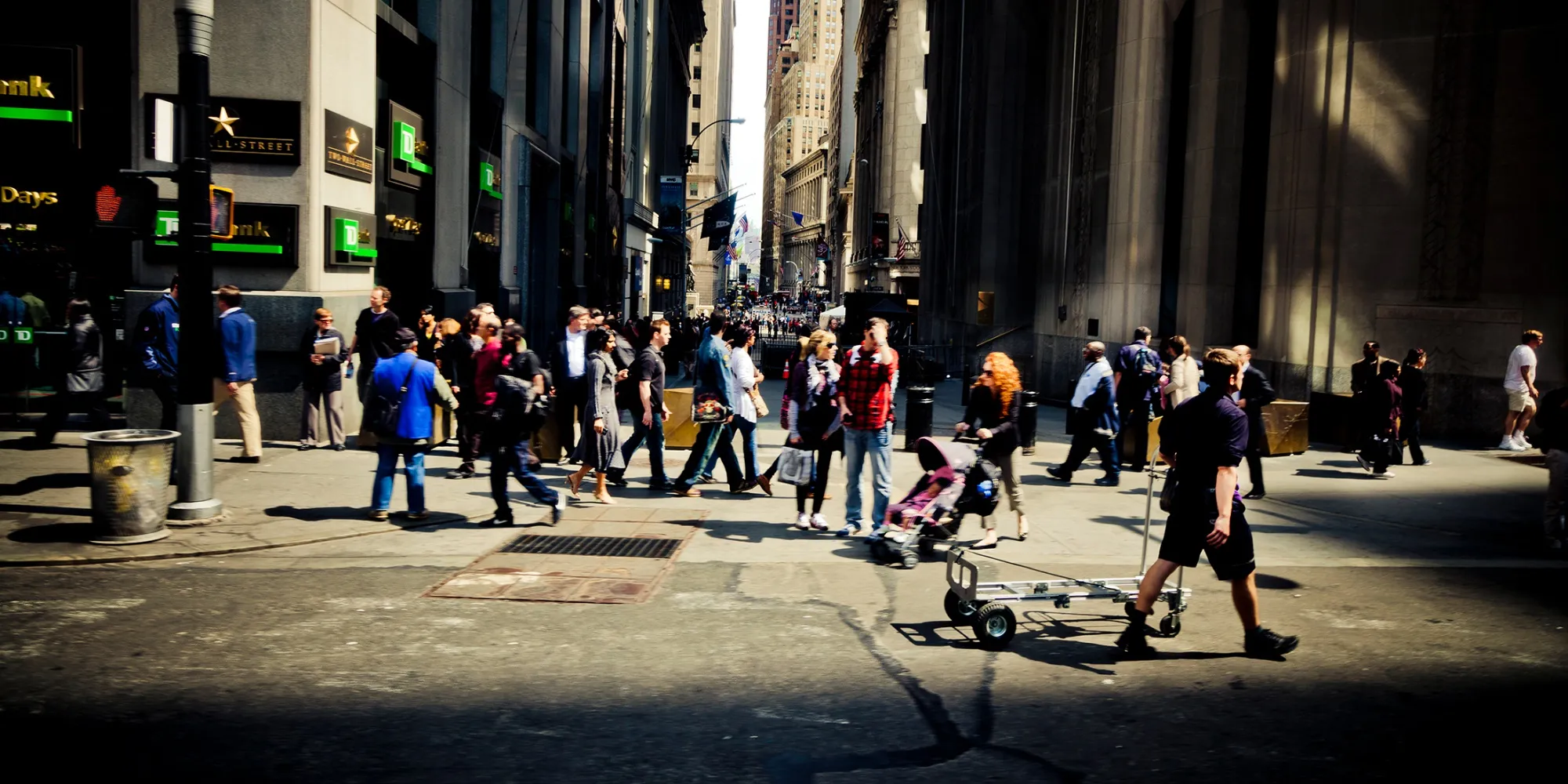 Pedestrians walking down Broadway NYC