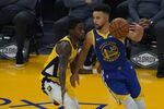 Golden State Warriors guard Stephen Curry (30) is defended by Indiana Pacers guard Edmond Sumner during an NBA basketball game in San Francisco, Tuesday, Jan. 12, 2021. (AP Photo/Jeff Chiu)