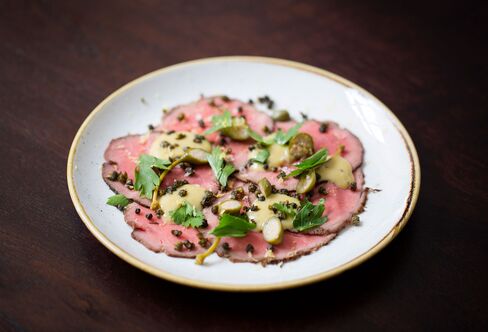 Vitello tonnato tastes good and is lifted by roasted capers, for crunch.
